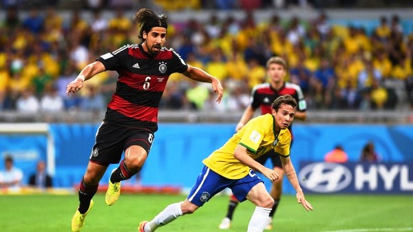 Bernard-Brazil-challenged-Sami-Khedira-Germany-compete-for-the-ball-in-the-match-between-Brazil-vs-Germany-Semi-finals-World-Cup-2014-at-Estádio-Mineirão-Belo-Horizonte-1025x576