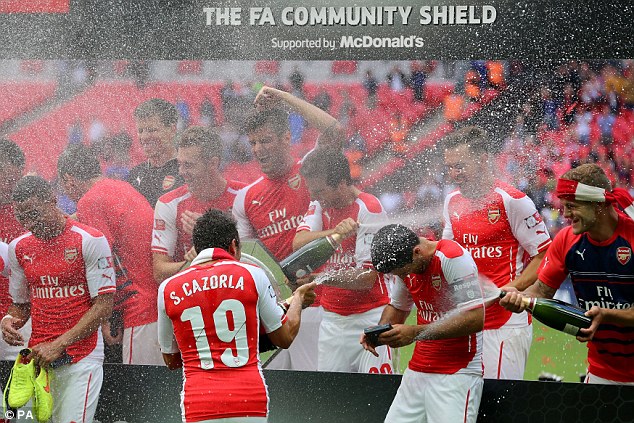 1407689367160 wps 1 Arsenal celebrate victory