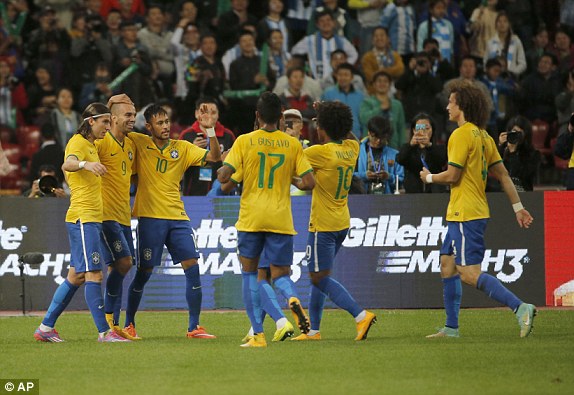 1413033709770 lc galleryImage Brazil s players celebrat