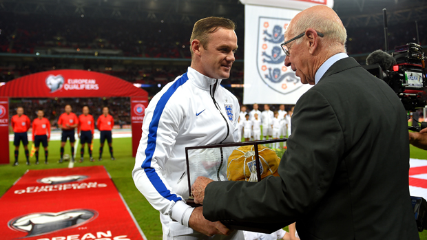 wayne-rooney-receives-his-100th-cap-from-sir-bobby-charlton.ashx