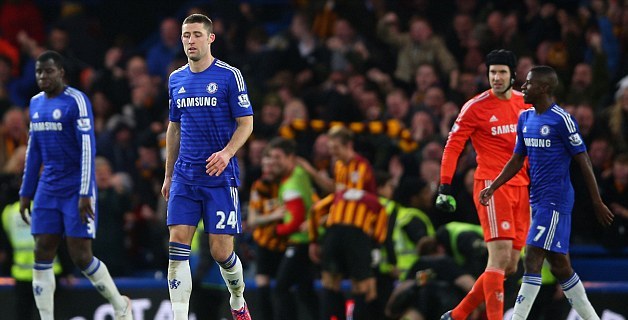 2502283800000578-2924751-Chelsea s players are left dejected after Bradford stage a stunn-a-10 1422123165356