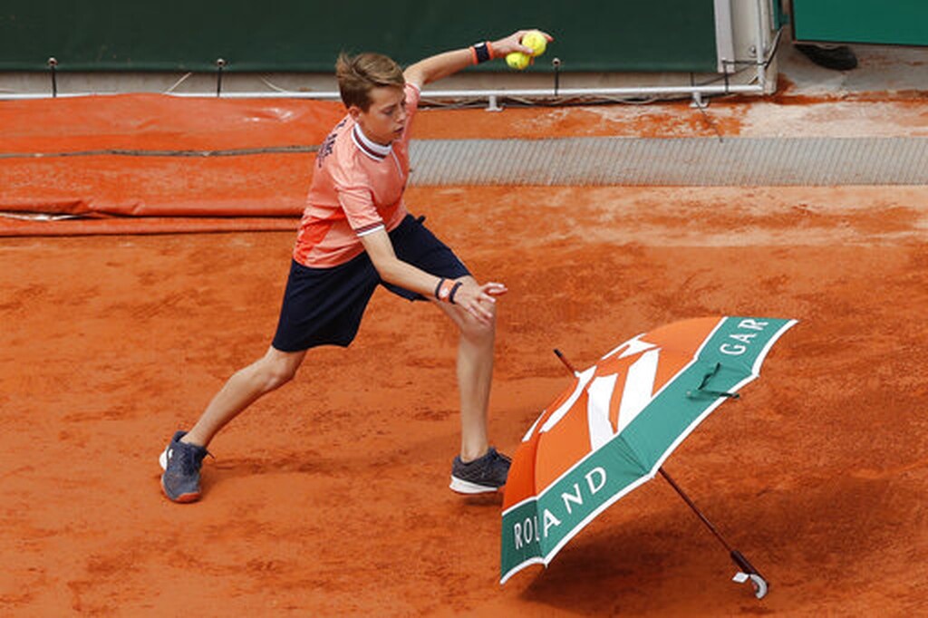 Ρολάν Γκαρός: Η βροχή νίκησε Τζόκοβιτς και Τιμ (photos)