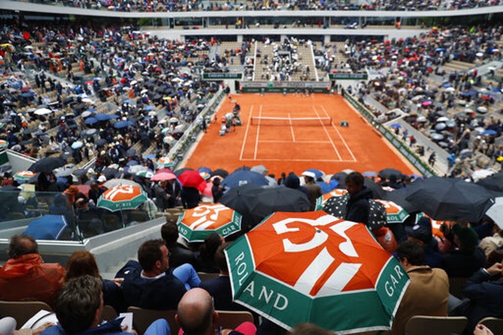 Ρολάν Γκαρός: Η βροχή νίκησε Τζόκοβιτς και Τιμ (photos)