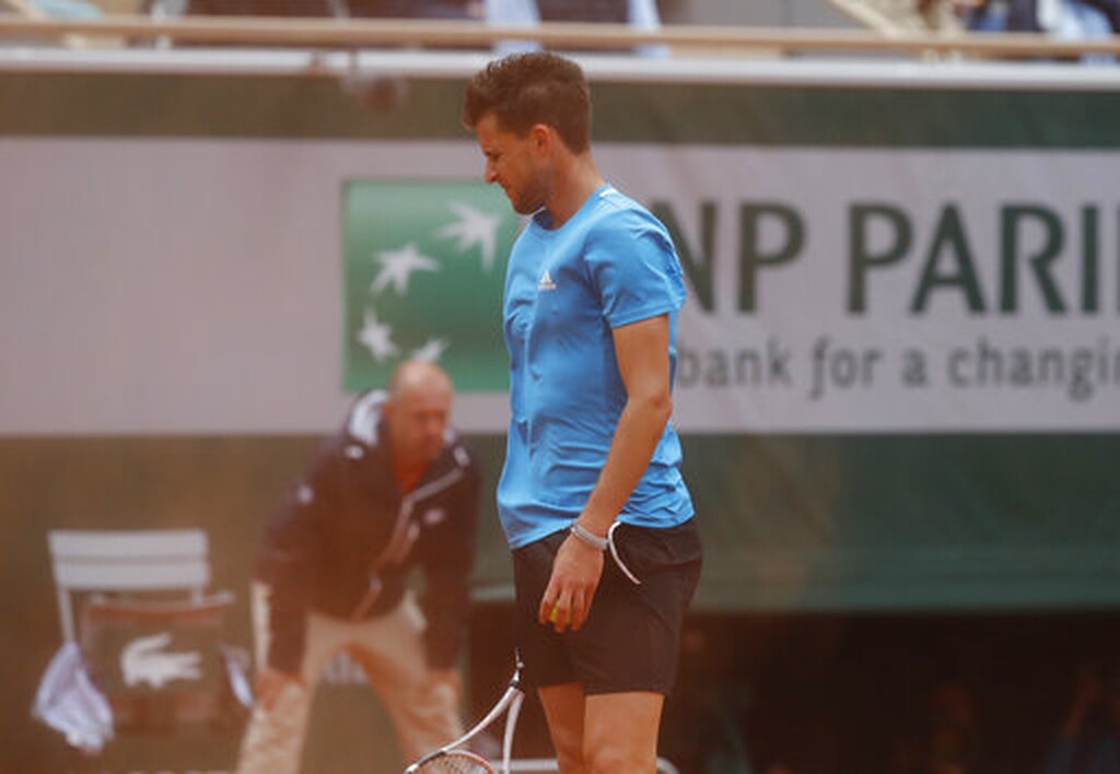 Ρολάν Γκαρός: Η βροχή νίκησε Τζόκοβιτς και Τιμ (photos)