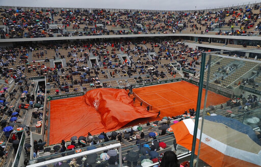 Ρολάν Γκαρός: Η βροχή νίκησε Τζόκοβιτς και Τιμ (photos)