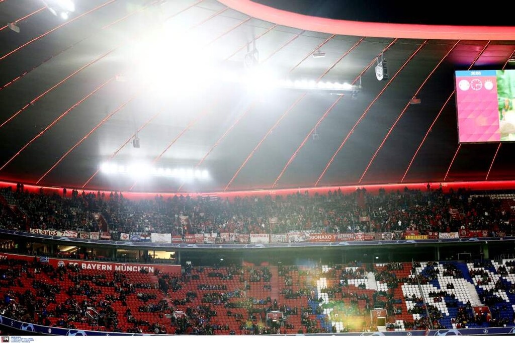 Μπάγερν Μονάχου-Ολυμπιακός: Δυναμική η «ερυθρόλευκη» εξέδρα στο βροχερό Μόναχο (photos)