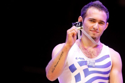 Η απονομή του χρυσού μεταλλίου στον Κοσμίδη