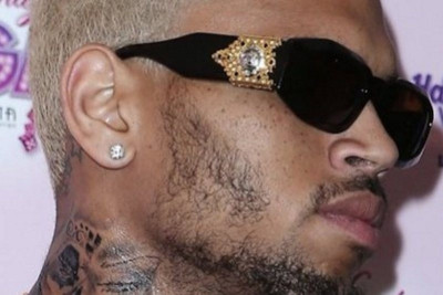 Ο Chris Brown έκανε τατουάζ το πρόσωπο της Rihanna