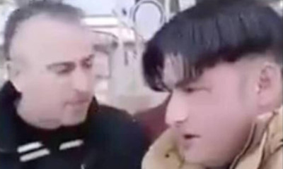 Εισαγγελική παρέμβαση για βίντεο με οπαδό που υποχρεώνει μετανάστη να κάνει τον σταυρό του