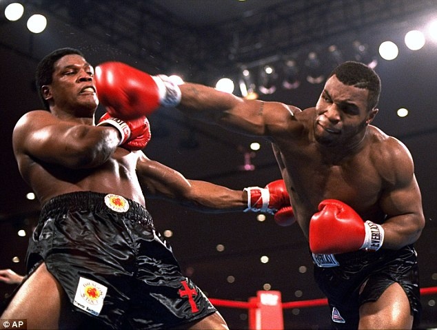 1410393549250 wps 56 Mike Tyson right delivers