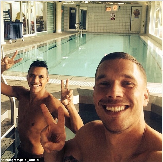 1411657024279 wps 13 Podolski and Sanchez