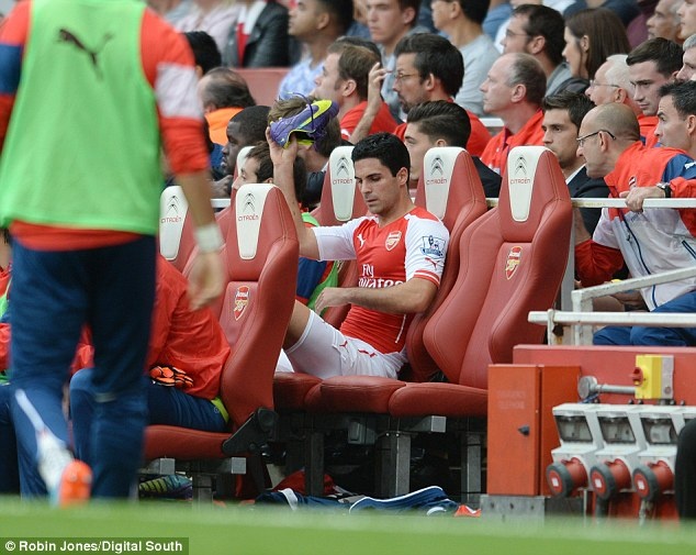 1411848938349 wps 18 Mikel Arteta Arsenal angr copy