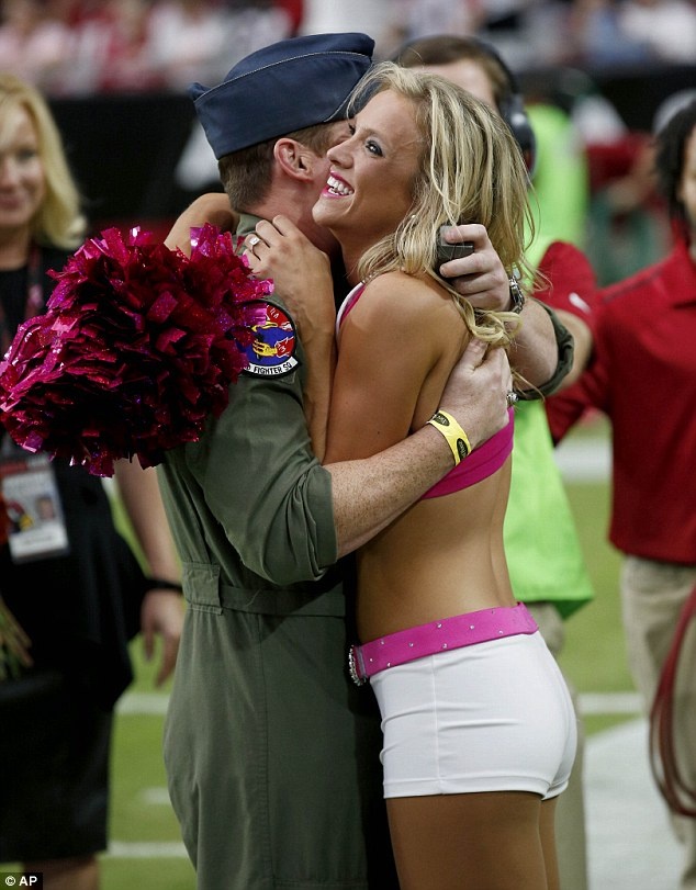1413157733991 wps 8 An airman hugs an Arizona