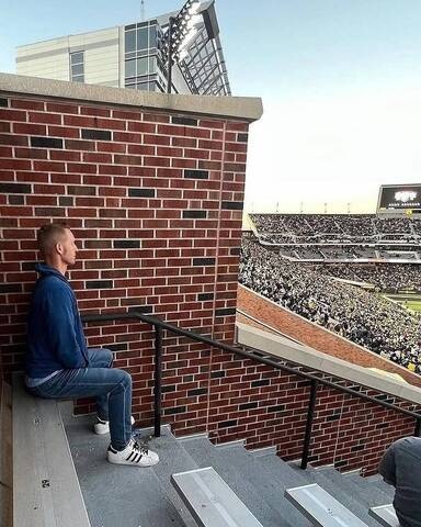One fan is traveling across college football stadiums to highlight the worst seats fans can buy. 1