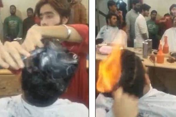 Εντυπωσιακό: Μπαρμπέρης βάζει... φωτιά στα μαλλιά ανδρών για να τους κουρέψει! (vid)